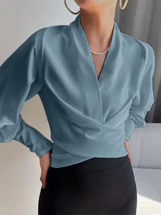 Damesblouses met V-hals en pofmouwen, flatterende taille, geschikt voor elke dag en feestjes.
