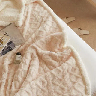 Dikke winterdeken van lamswol met fleecevoering voor extra warmte en comfort. Wit