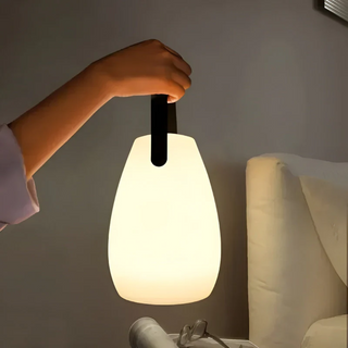 Draagbare, waterdichte, draadloze tafellamp voor binnen- en buitengebruik met flexibele plaatsingsmogelijkheden en een stijlvol, modern design.