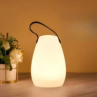 Draagbare, waterdichte, draadloze tafellamp voor binnen- en buitengebruik met flexibele plaatsingsmogelijkheden en een stijlvol, modern design. C