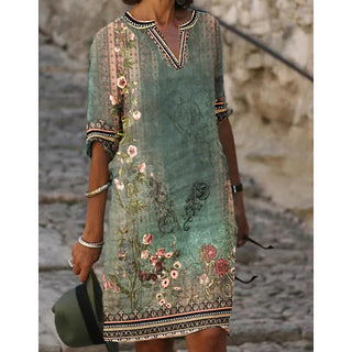Cicada | Zomerjurk met korte mouwen, V-hals en bloemenprint voor dames | Midi groen