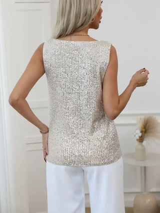 Manda | Glittertop met V-hals voor dames, versierd met pailletten en sprankelende details.