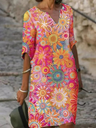 Thara | Jurk met V-hals en bloemenprint roze