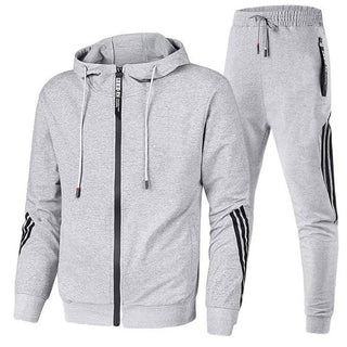 Heren trainingspak. Hoogwaardig materiaal. Tijdloze stijl. grijs