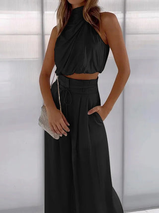 Luxe tweedelige set met elegante top en broek, geschikt voor feestjes en dagelijks gebruik.