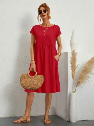 Sol | Moderne damesjurk – Sol Design, Sculpturaal Silhouet & Eigentijdse Elegantie oranje-rood