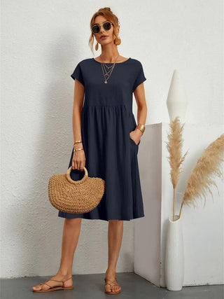 Sol | Moderne damesjurk – Sol Design, Sculpturaal Silhouet & Eigentijdse Elegantie marineblauw